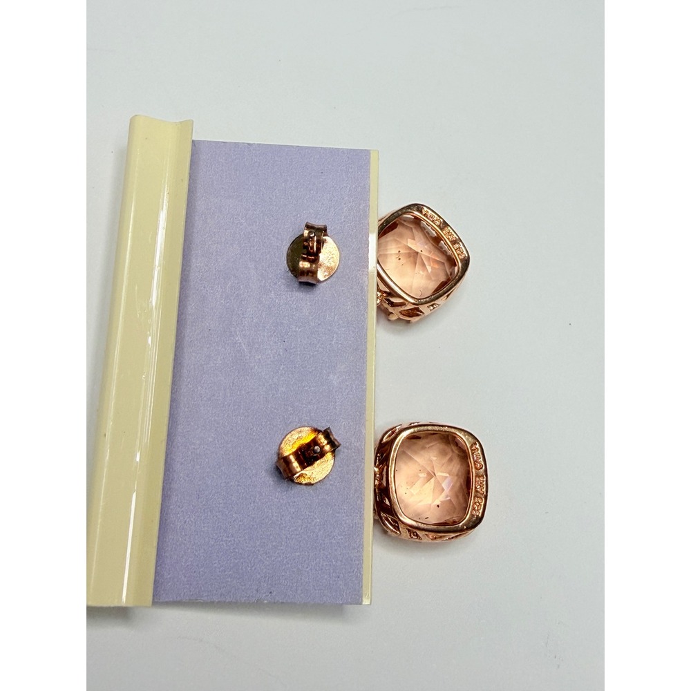 Leaf and Lavender brand earrings feature large, peach-colored silver. - Picture 5 of 5